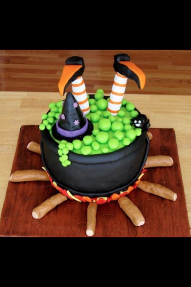 I love the cute simplicity. Makes me want to make a large cauldron cake. Cake Wrecks - Home - Sunday Sweets: Halloween Treats