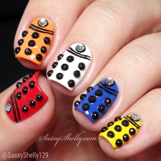 5 Little Daleks :) Who’s excited for the new season of #DoctorWho tonight? I am! In the episode #VictoryOfTheDaleks the Doctor met 5 “genetically pure” colorful Daleks - here they are on my nails. This is for Day 4 of #DigitalDozen re-creation week and was inspired by @adventuresinacetone’s awesome Dalek skittle mani.#nailart #whovian #thedoctor #daleks #zoyanailpolish