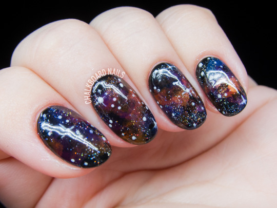 Jewel toned galaxy nails