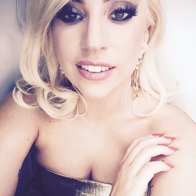 Lady Gaga instagram “Another beautiful year I am grateful to attend be nominated and perform at the Grammys :) got my gold on!”