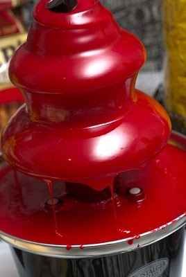 "Yummy! Halloween blood fondue bar. Basically instead of brown chocolate chips, you use white chocolate chips and add red food coloring.